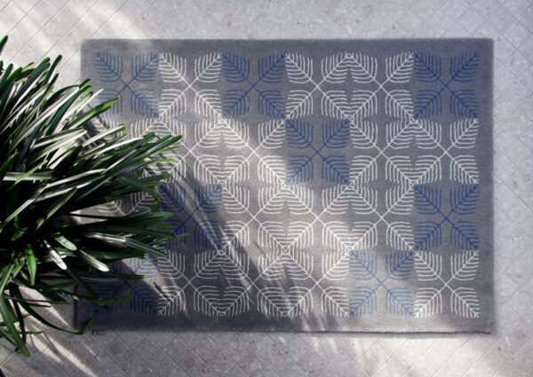 Modern Estonian rug Sine with traditional cross motif