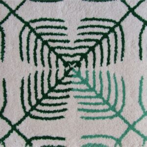 Raho modern rug with a geometric ornamental pattern, made from natural New Zealand wool