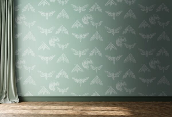 Designer wallpaper Amazing Moths with a pale green background, featuring white moths and the moon in stippling technique.