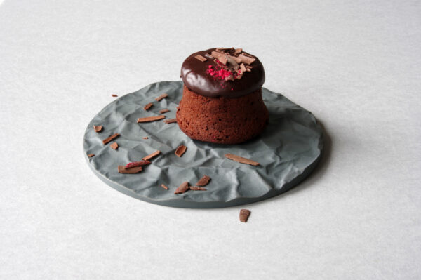 Arid grey porcelain serving tray with crumpled paper texture, matte finish