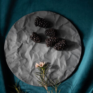 Arid grey porcelain serving tray with crumpled paper texture, matte finish