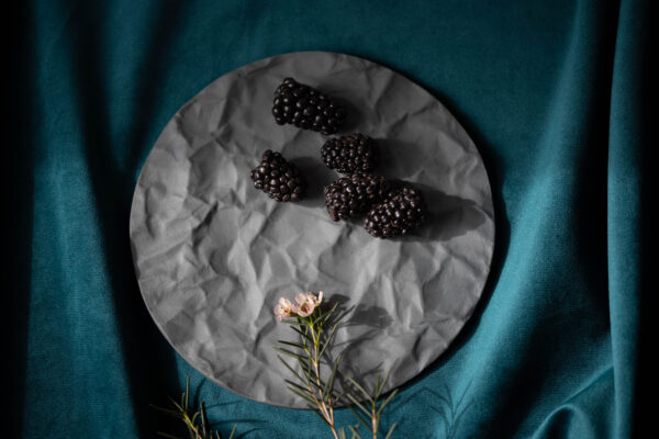Arid grey porcelain serving tray with crumpled paper texture, matte finish