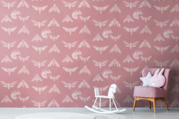Artistic designer wallpaper Amazing Moths with an antique pink background and delicate white moths, a perfect choice for a child’s room or a romantic interior.